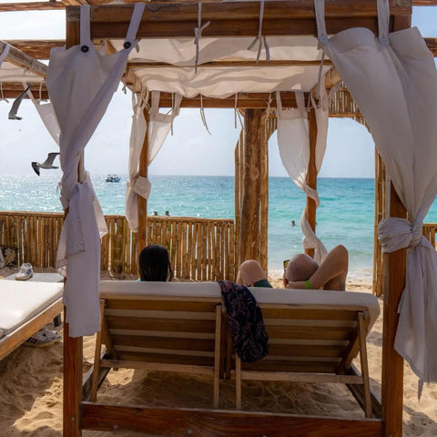 Guests enjoying the sun at Mambo Beach Club, Playa Blanca, Barú Island