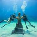 Diver with instructor in clear Caribbean water San Andrés