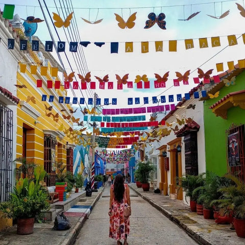 Walking through Getsemani with colorful colonial-style homes